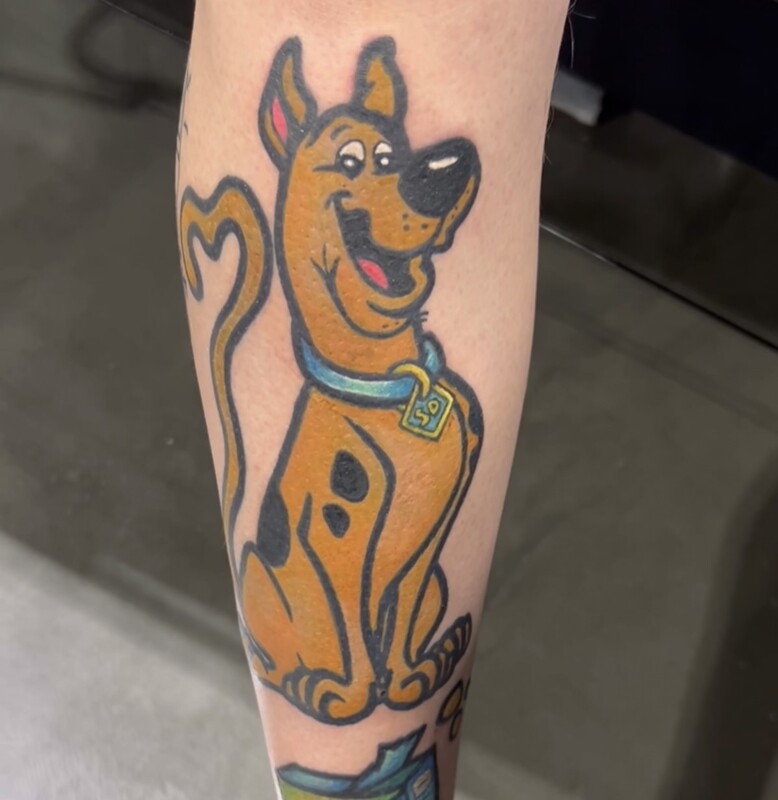 Scooby Doo neo traditional tattoo on a man's lower leg.